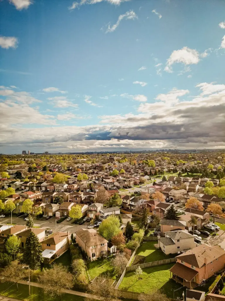 Aerial view of a suburb under clouds