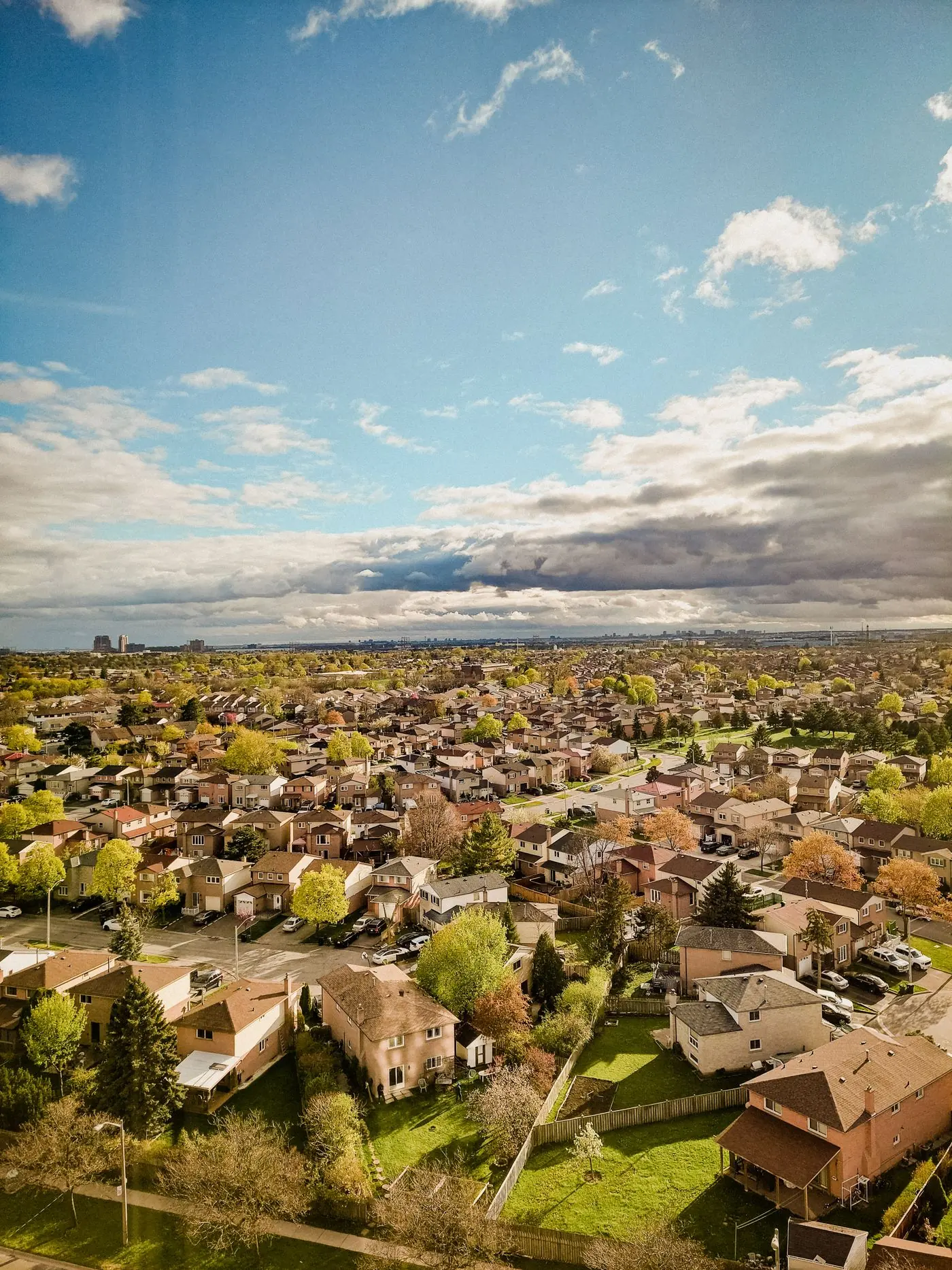 Aerial view of a suburb under clouds
