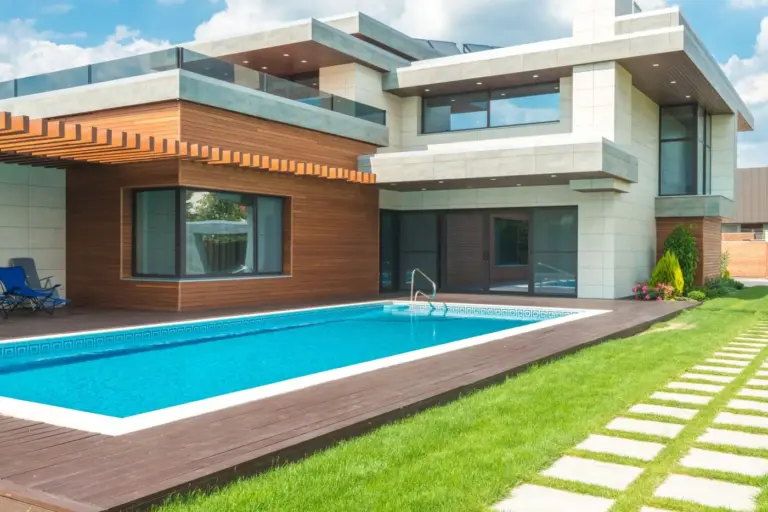 Modern home with a backyard swimming pool