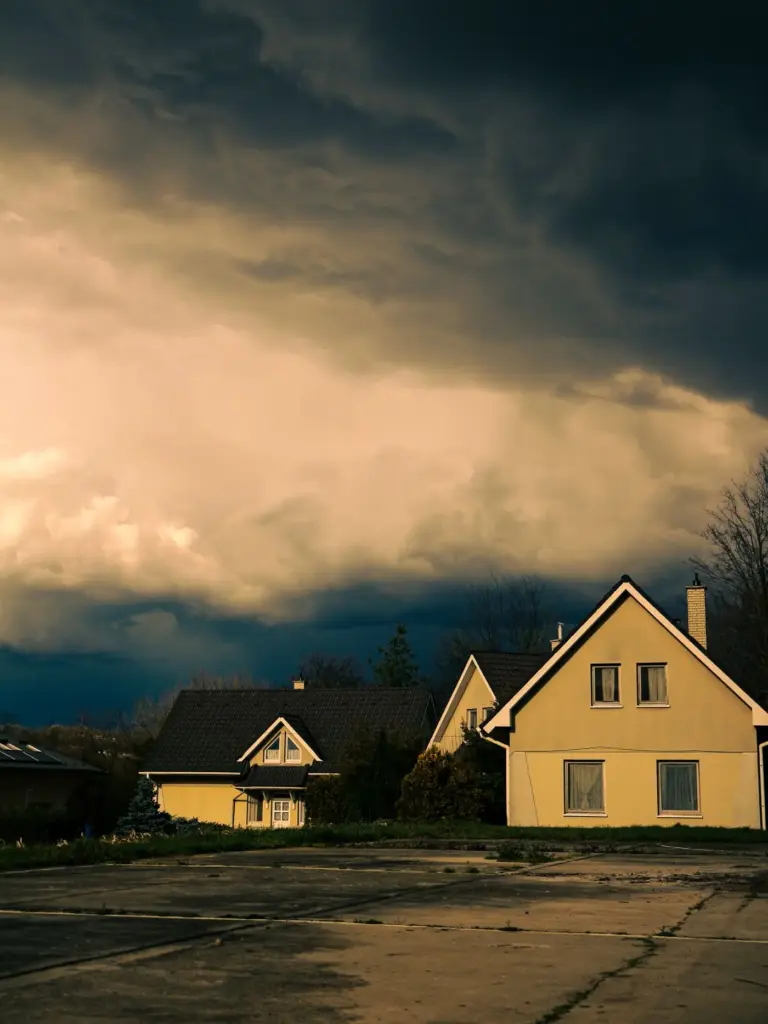 Storm clouds gathering over a neighborhood